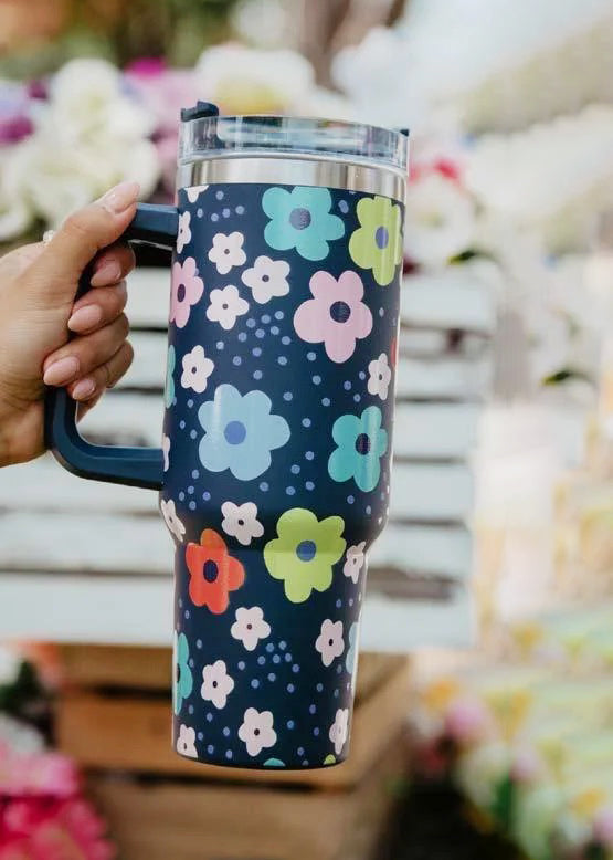 Tumbler azul con flores