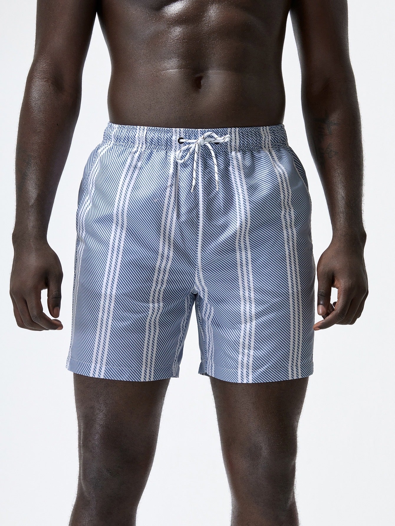 Calzoneta de doble linea blanca y azules de hombre