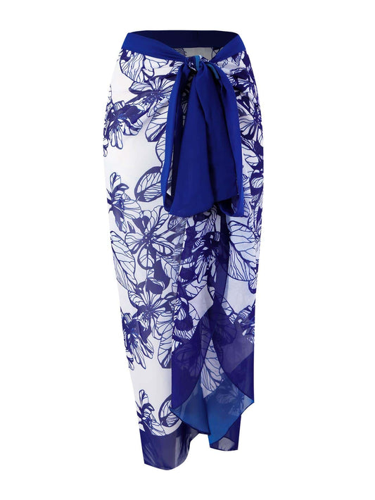 Salida de bano pareo azul con estampado de flores