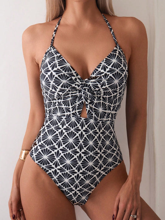 Calzoneta negra con flores y nudo al centro