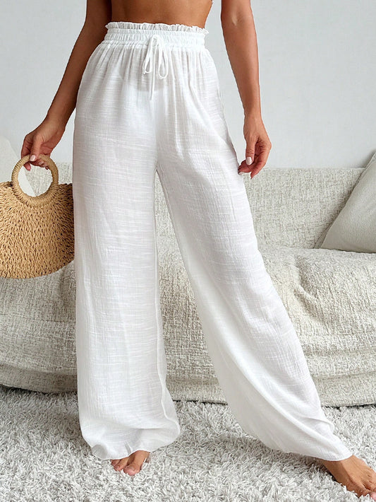 Salida pantalon blanco con elastico y vuelo arriba