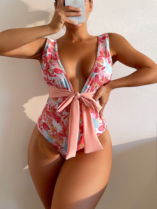 Calzoneta celeste con flores rosadas y cinruton rosado palido