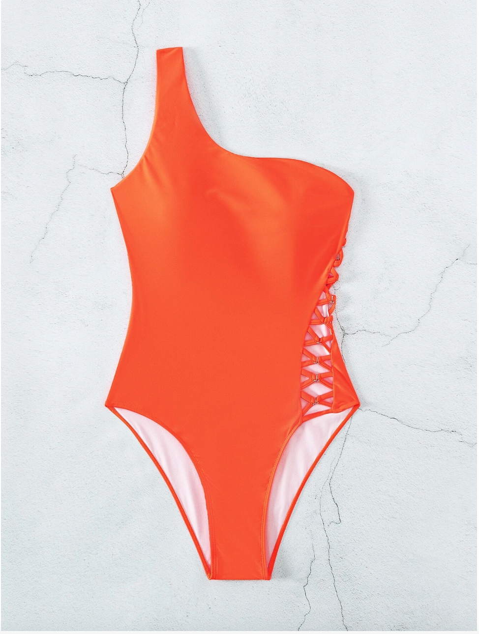 Calzoneta anaranjada con detalle corsé de lado
