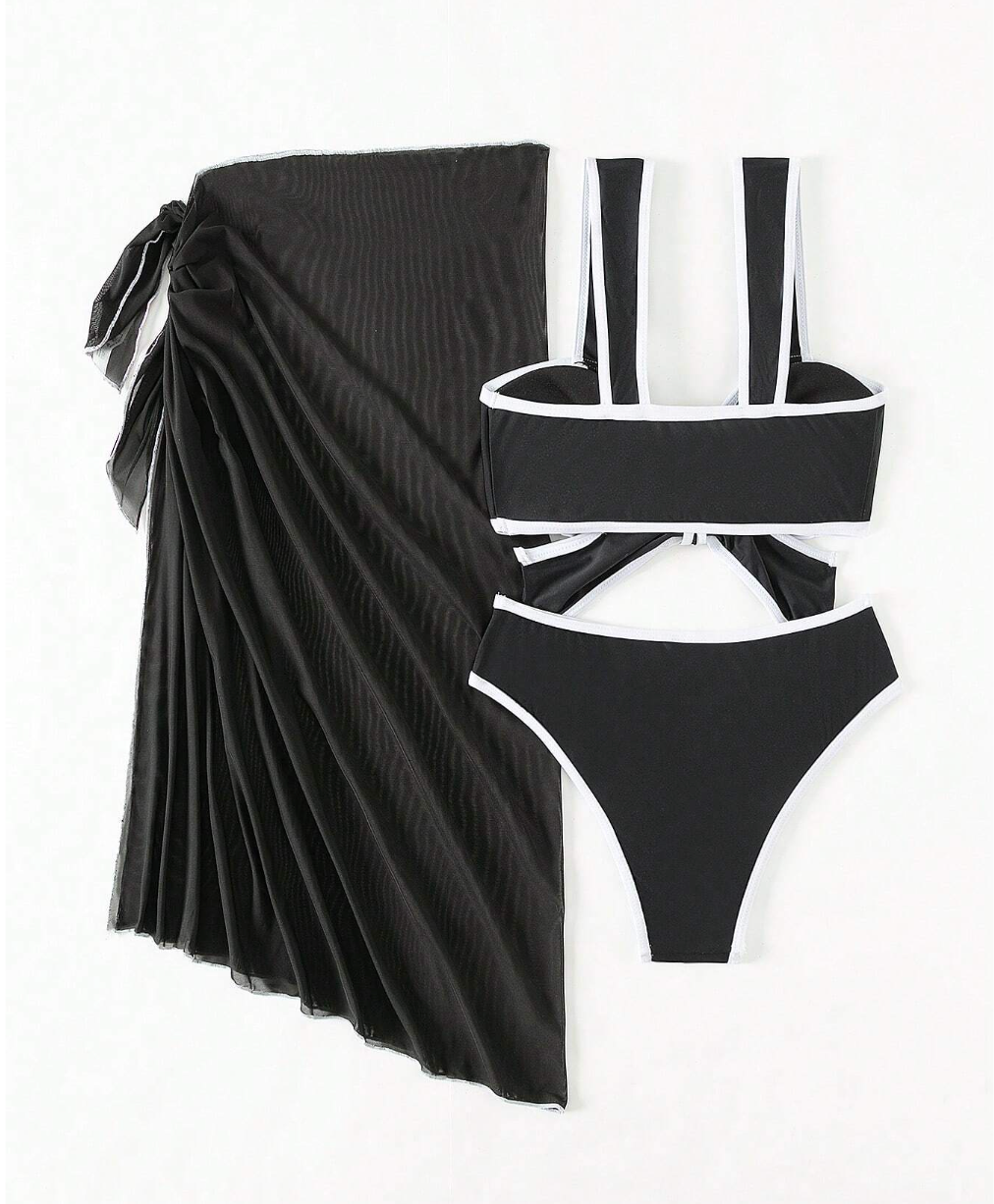 Set de bikini negro mona y orilla blanca con pareo negro