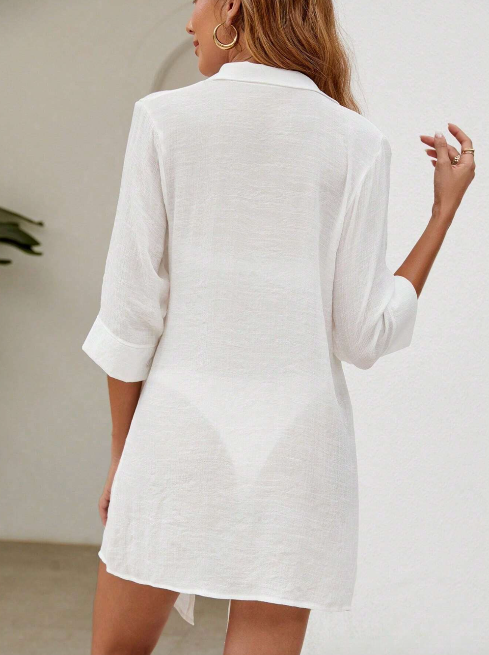 Salida blanca tipo camisa de botones larga