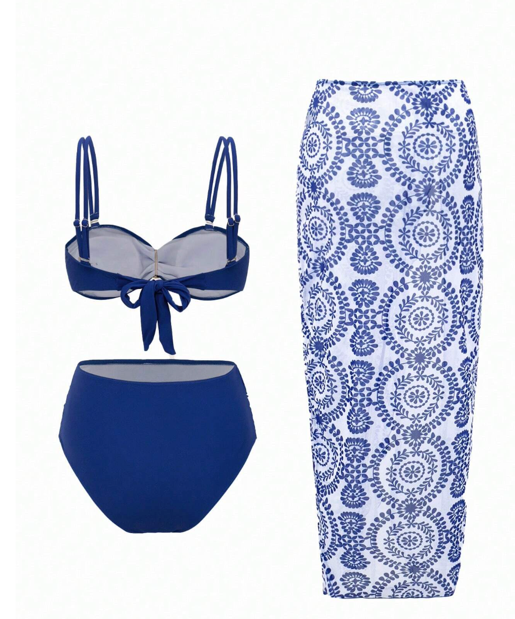 Set de bikini azul con centro dorado con falda y flor