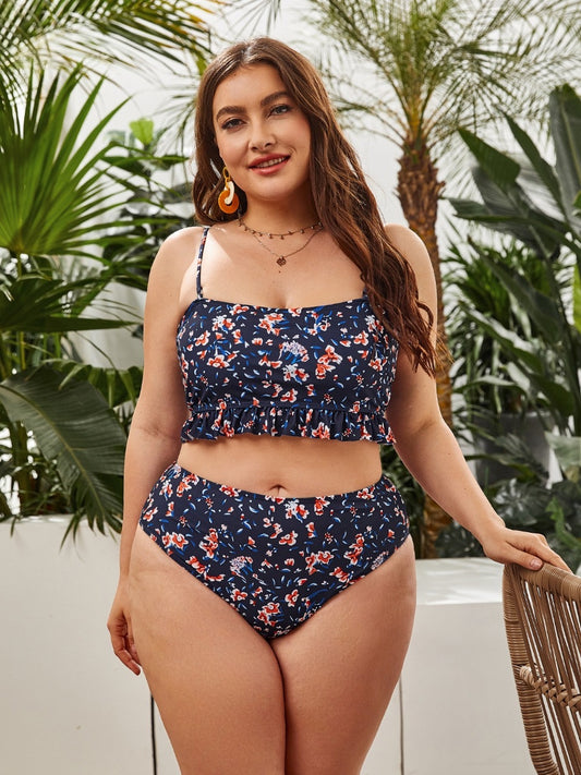 Bikini azul oscuro con flores rojas
