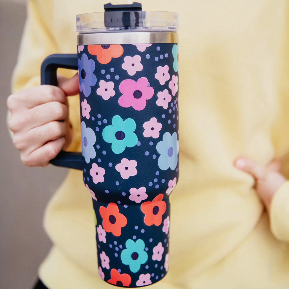 Tumbler azul con flores